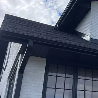 New black gutter system on home