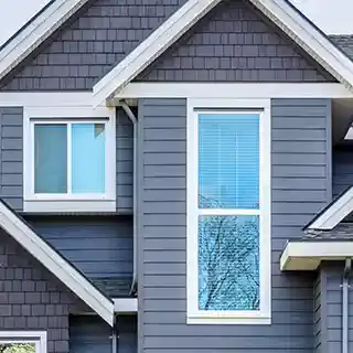 Blue purple siding on home